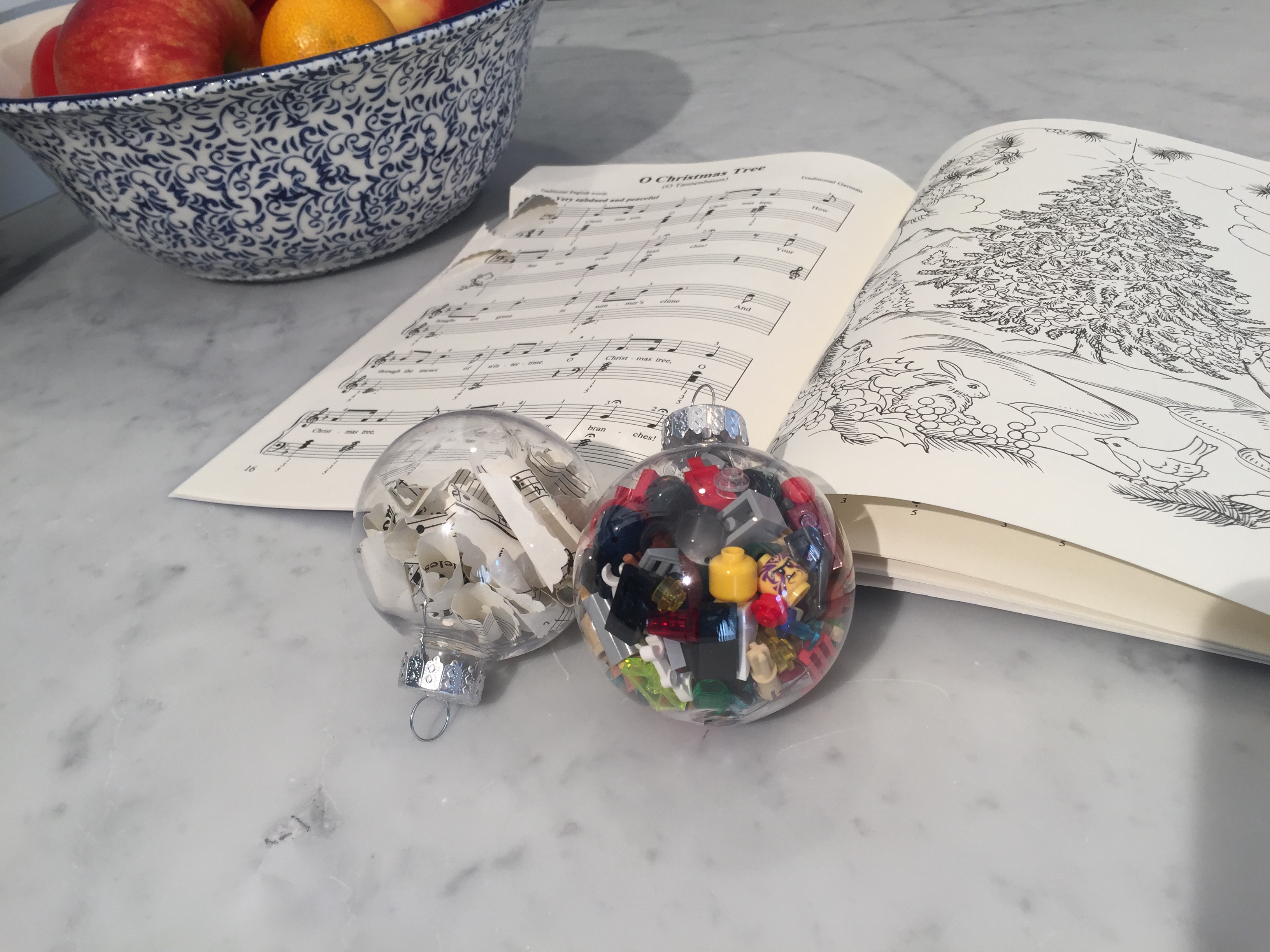 DIY Christmas Ornaments Filled with Sheet Music and Legos
