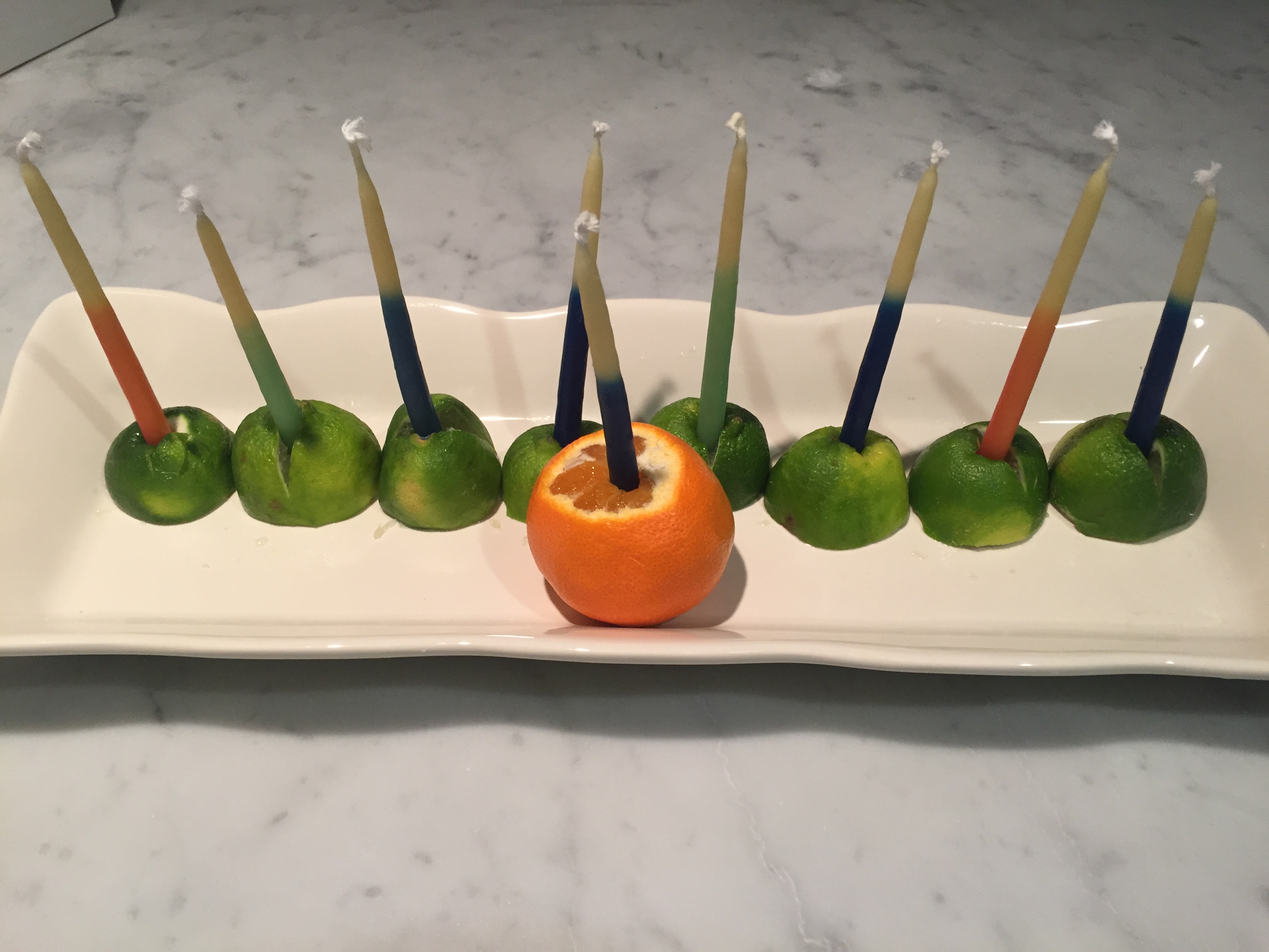 Use/Re-use items in your house for holiday decor - a fruit filled Hanukkah menorah